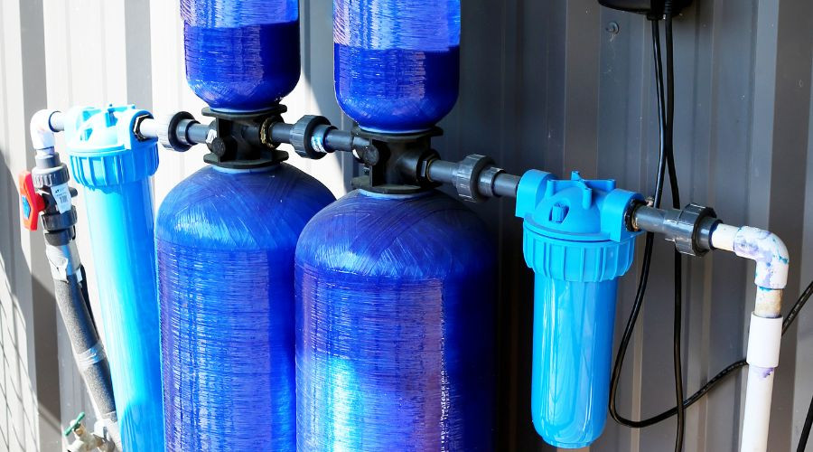 Water filtration system with blue tanks.